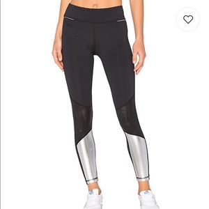 Alala blocked tight in silver and black